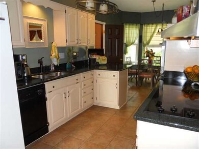Outstanding eat-in kitchen comes equipped with upd