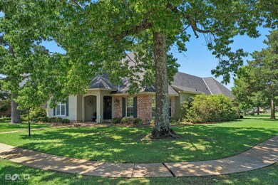 View of front of house with a front lawn