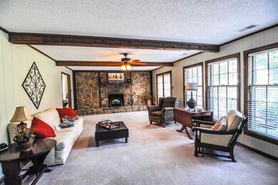 The family room measures 25x15 and leads to the ba