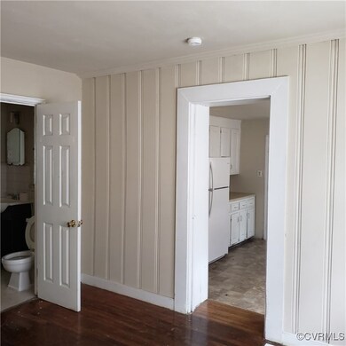 Hallway featuring hardwood / wood-style flooring