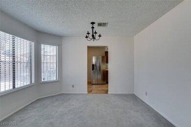 Unfurnished dining area with a chandelier, light c