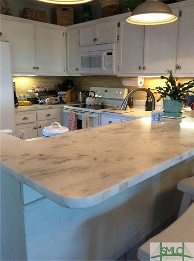 New granite in kitchen with breakfast Bar