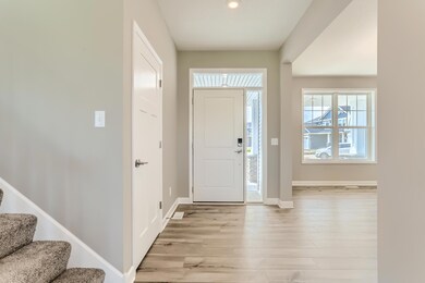 Spacious entry with open concept from the second you step foot in this home. Photos of available home! Home is available for tours!