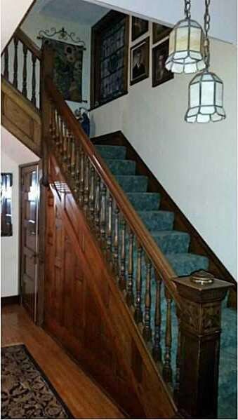 Entry/Foyer. Entry with original woodwork - stairc