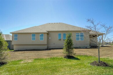Yard is level.  Located on corner lot.  Large side