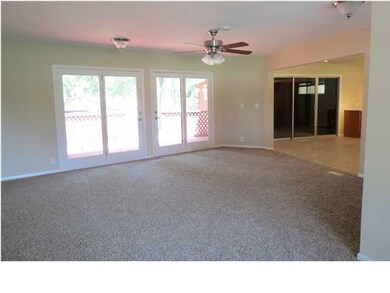 Main floor family room has double French doors to 