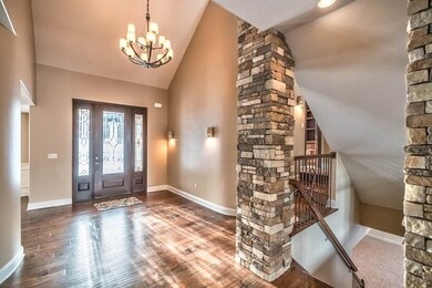 Wonderful high ceilings and custom built staircase