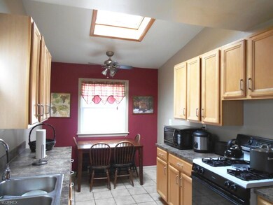 The Updated Kitchen features a skylight and space 