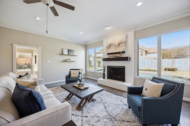 The family room blends comfort and elegance, featu