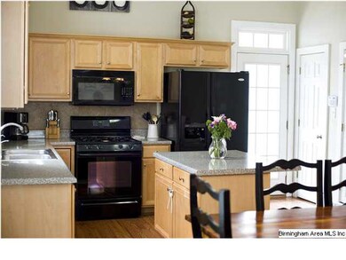Kitchen...stove, microwave, refrigerator to remain