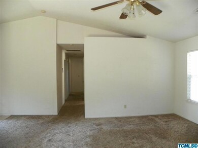 Vaulted ceiling in living room.