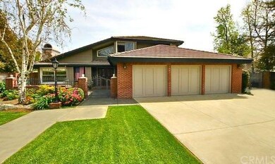 3 car garage plus 2 car garage & RV parking