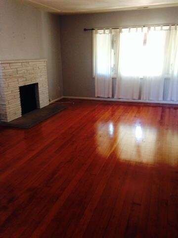 Top unit living room - original hardwood floors an