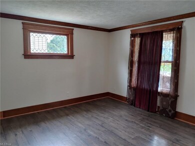 Living Room with decorative leaded glass window an