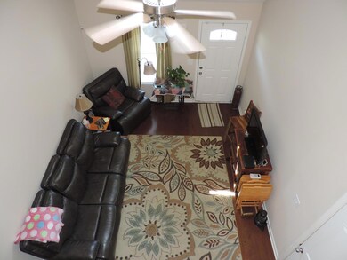 View of great room from upstairs landing.
