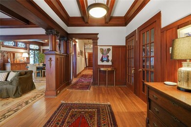 Foyer entrance flanked by true Craftsman details.