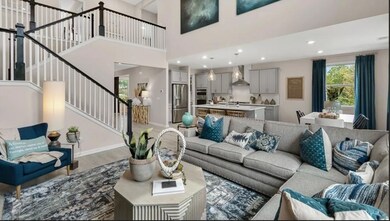 Living room with stairs, wood finished floors, recessed lighting, and baseboards