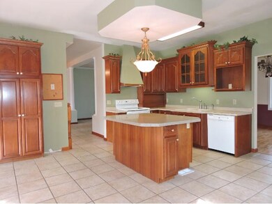 Great open design to this kitchen with granite cou