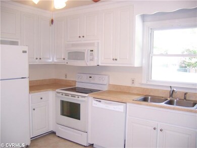 Kitchen - Beautiful White Cabinets, Dishwahser, Stove, Microwave and fridge all convey