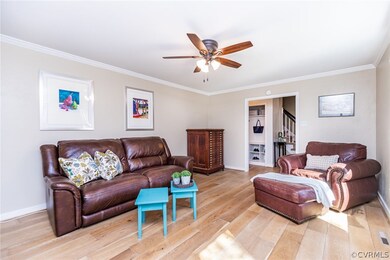 Front of the house to the left when you walk in