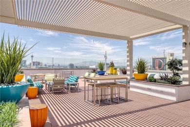 View of patio with a pergola, outdoor dining area,