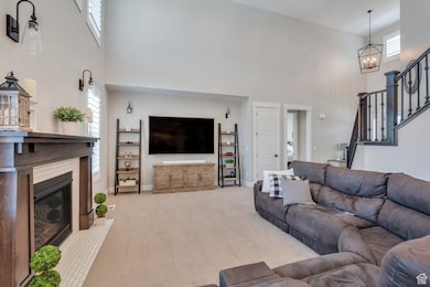 Showcasing a chic built-in fireplace with custom mantle and tile finishes!