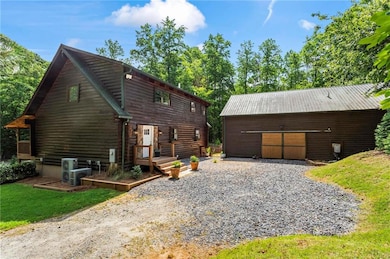 View of front of property with an outbuilding