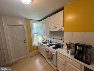 713 E 23rd St, Baltimore, MD 21218 - photo 6