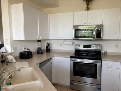Kitchen with new stainless steel appliances with s
