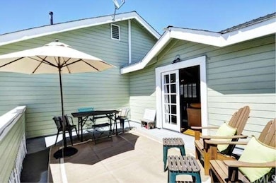Large patio for entertaining is accessed from the 