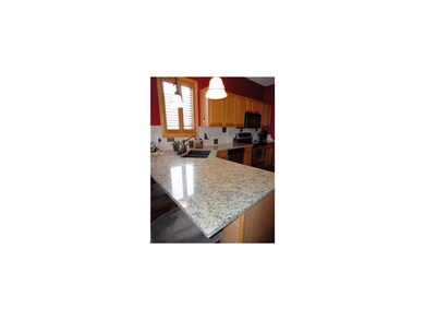 Kitchen. Beautiful granite and deep sink.