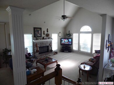 Living room is bathed in light from large picture