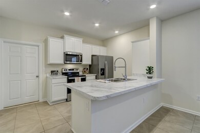 Kitchen includes stainless steel appliances, micro