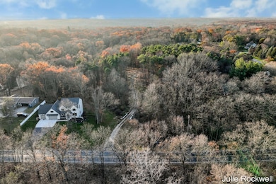 3669 Buttrick Ave SE, Forest Hills, MI 49301 - photo 5