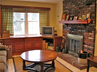 FAMILY ROOM WITH WOOD FIREPLACE