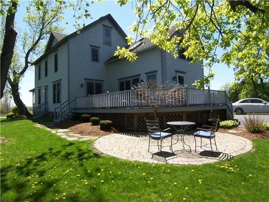 Exterior Back WRAP AROUND DECK WITH STONE PATIO