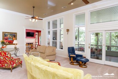 This oversized family room flows effortlessly to the large family room that not only offers a center island and pantry but also includes a wonderful dining space AND the most darling hearth room to really make this space the heart of the home!