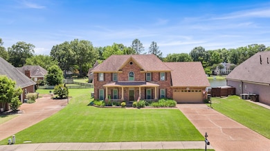 Lovely brick home on quiet street that has a beautiful lake view!
