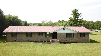 New landscaping enhances this country living property.