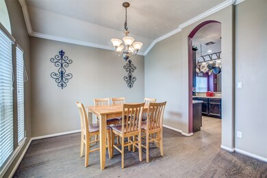 Formal dining room that opens up to the kitchen
