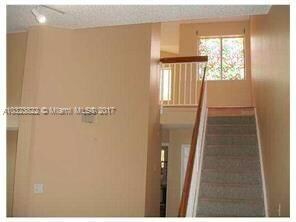 VIEW TO STAIRS TO SECOND FLOOR