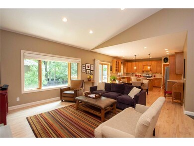 open space and vaulted ceilings highlight this hom