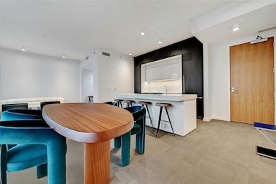 Dining area with baseboards, visible vents, and r