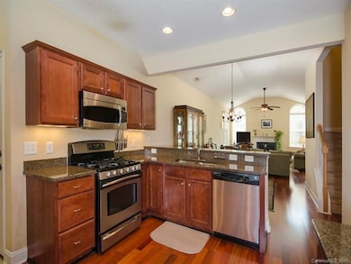 This is an entertaining kitchen with beauty all ar