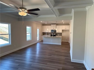 Kitchen with appliances with stainless steel finis