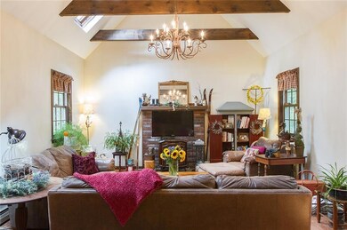 Great room with skylight, exposed...