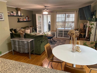 Family room with door leading to covered deck.