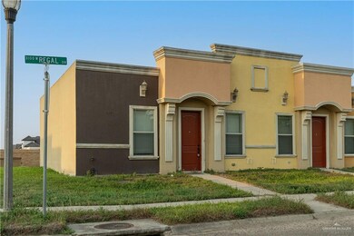 View of property with stucco siding
