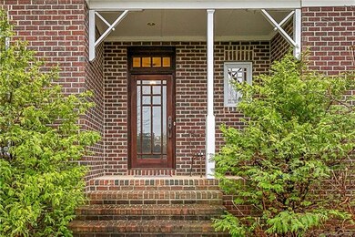 Entrance door is unique and designed by property's owner