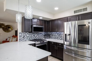 Quartz countertops with pendant lighting
